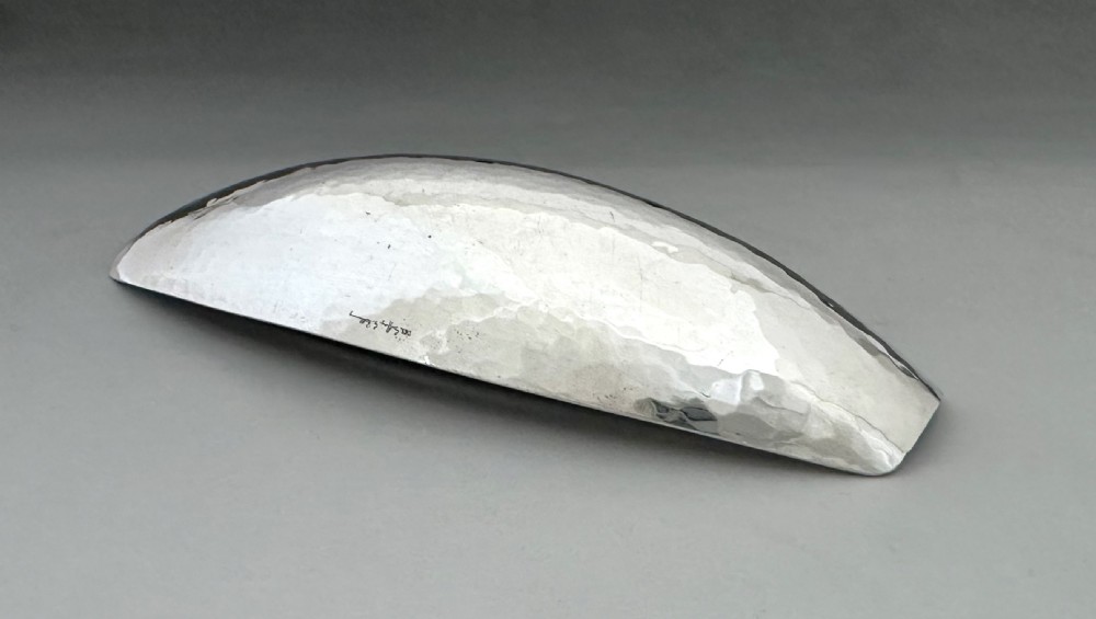 A modernist silver trinket dish by A.E Jones View IX