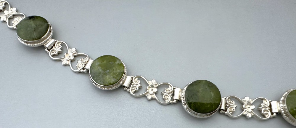 An attractive Irish silver & Connemara marble bracelet View V