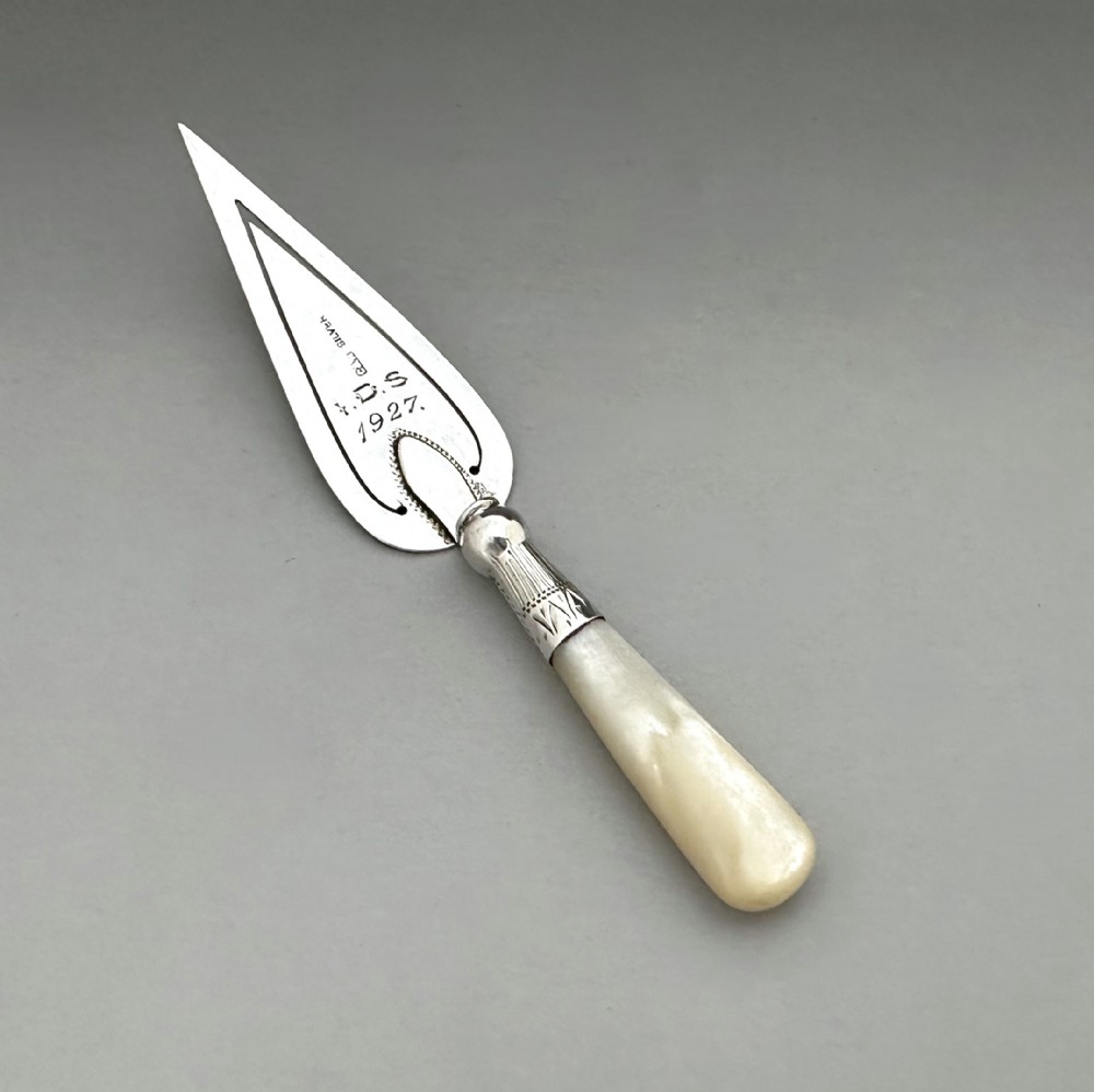 A charming large silver & mother-of-pearl bookmark