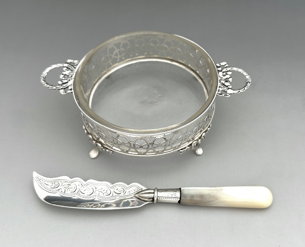 A gorgeous pierced silver butter dish & knife