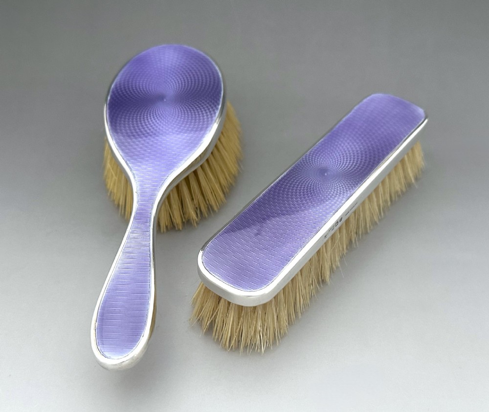 A lovely pair of George V silver & guilloche enamel brushes View II