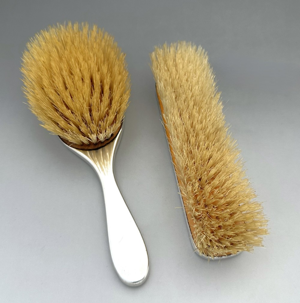 A lovely pair of George V silver & guilloche enamel brushes View V