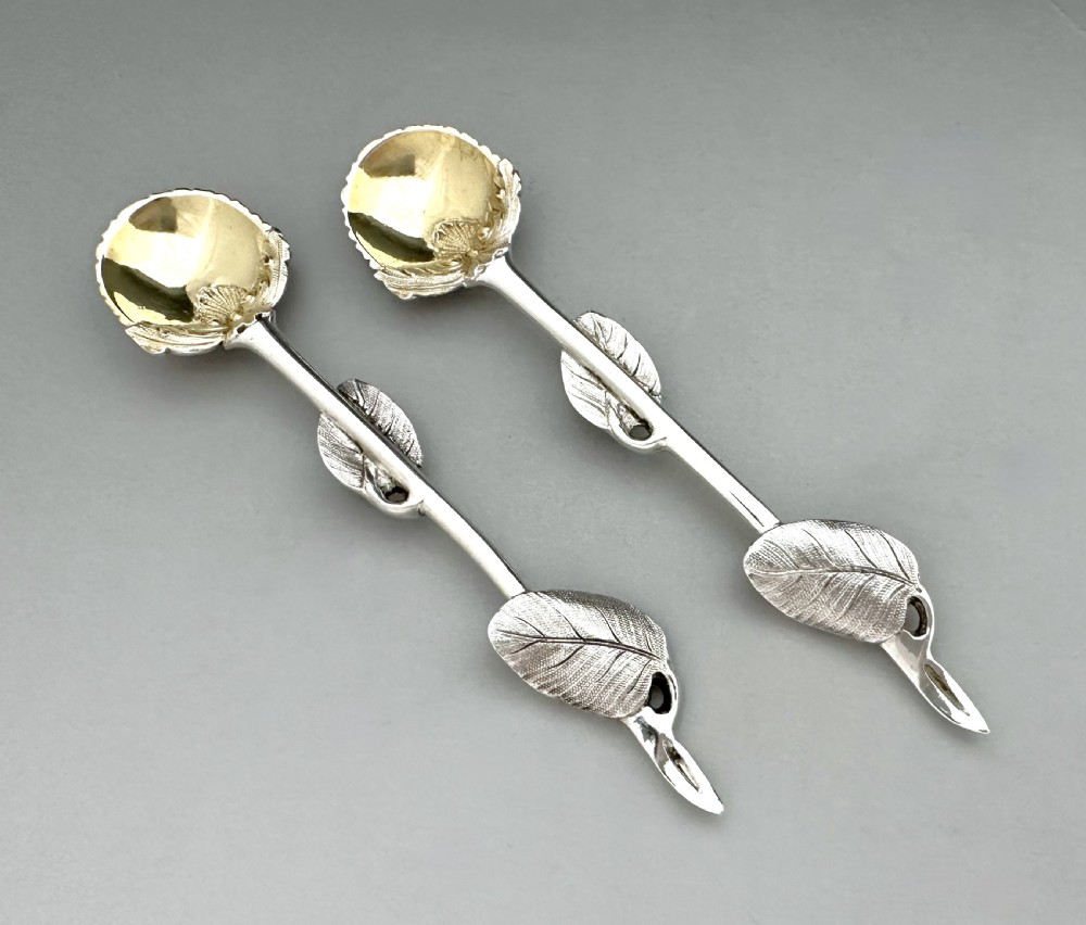 A fabulous pair of Victorian Naturalistic cast silver salt spoons 