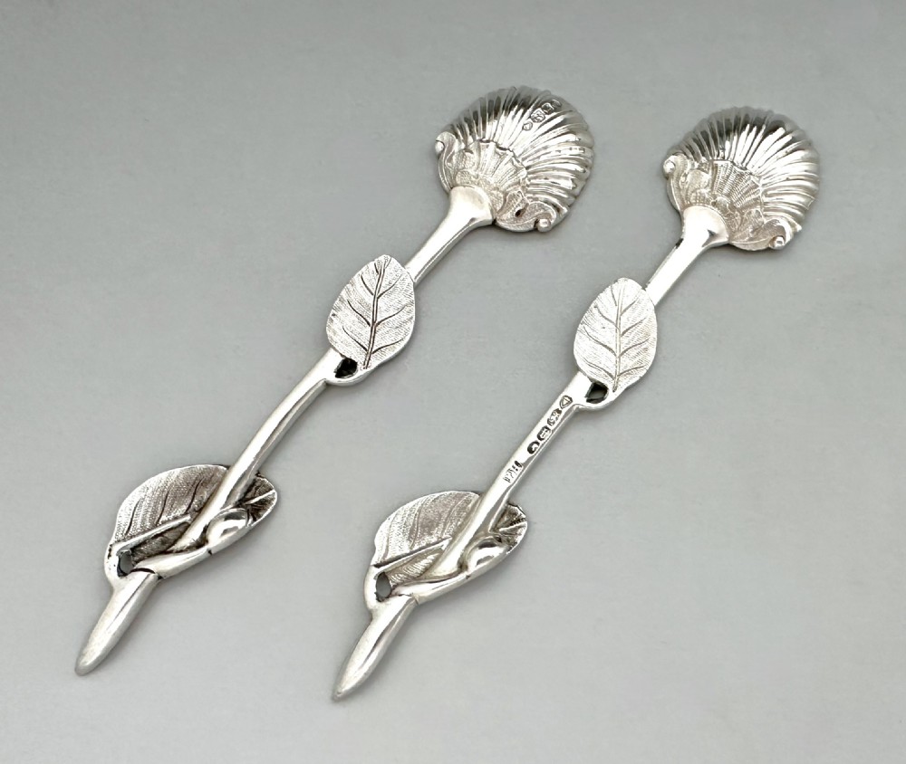A fabulous pair of Victorian Naturalistic cast silver salt spoons  View IV