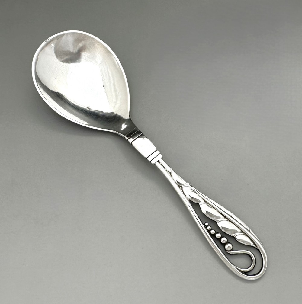 A stylish George Jensen silver preserve spoon