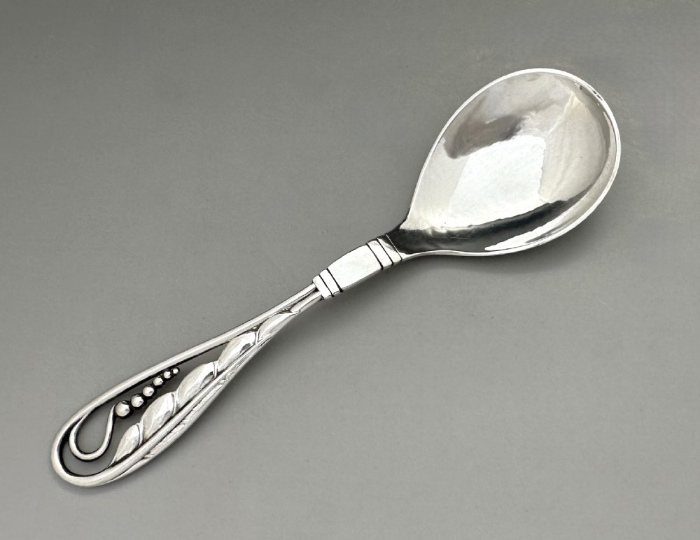 A stylish George Jensen silver preserve spoon View II