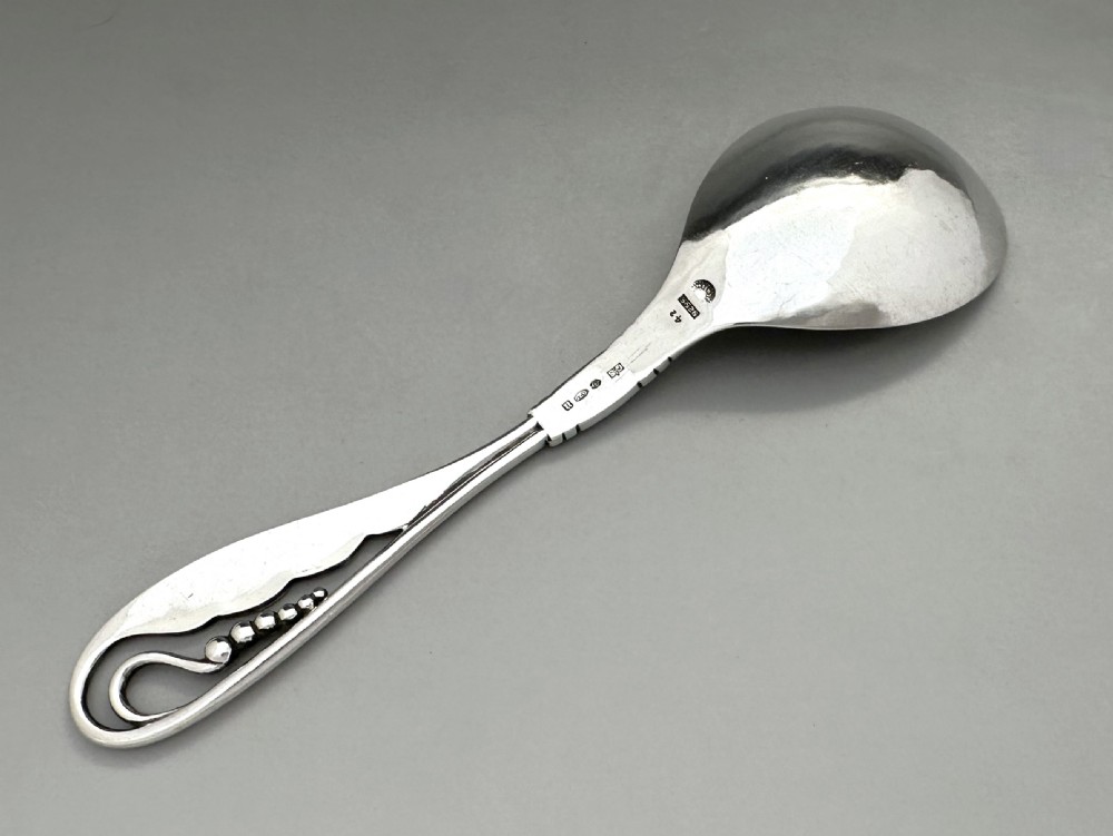 A stylish George Jensen silver preserve spoon View III