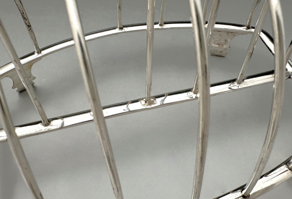 A handsome George III silver toast rack View VI