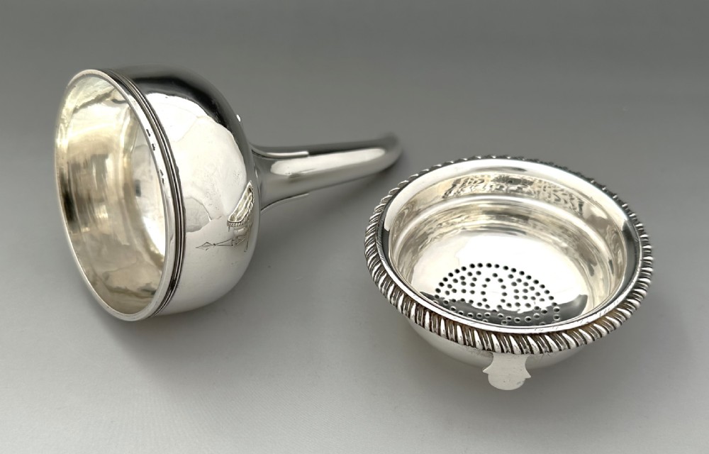 A superb George III silver wine funnel & strainer View IX