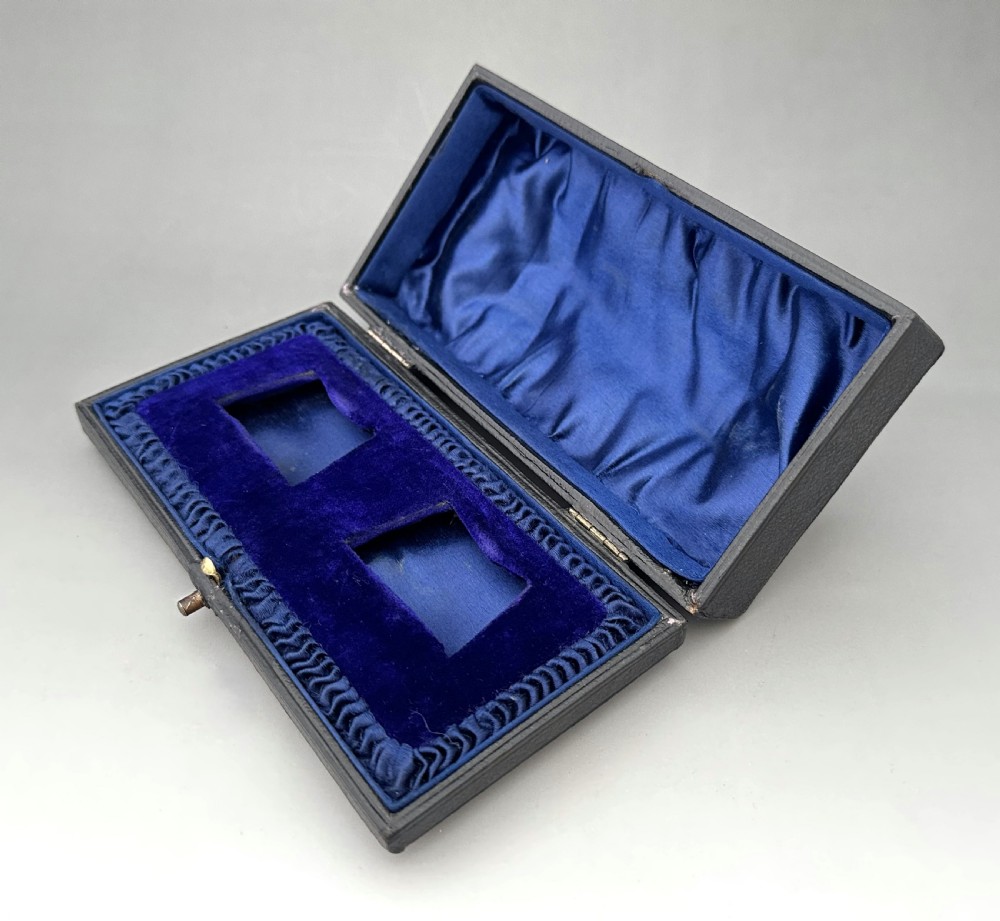 A fine pair of boxed Edwardian silver napkin rings View VI
