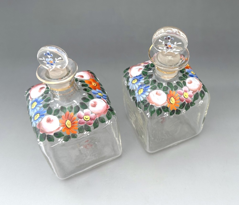 A gorgeous pair of perfume/ cologne bottles with enamelled decoration View II