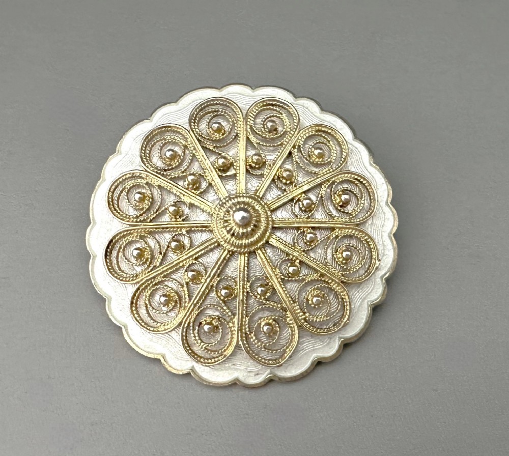 An attractive Norwegian silver gilt & guilloche enamel brooch