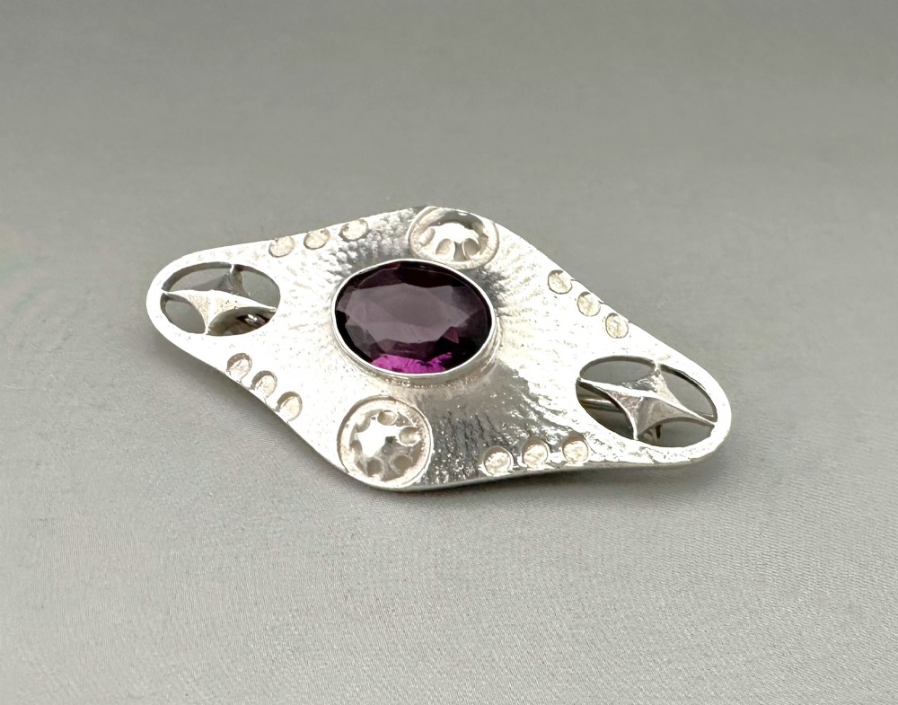 A charming early 20th Century silver & Amethyst brooch