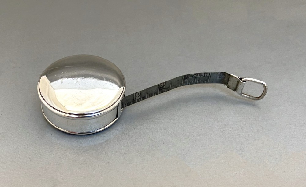 A superb Victorian silver cased tape measure View II