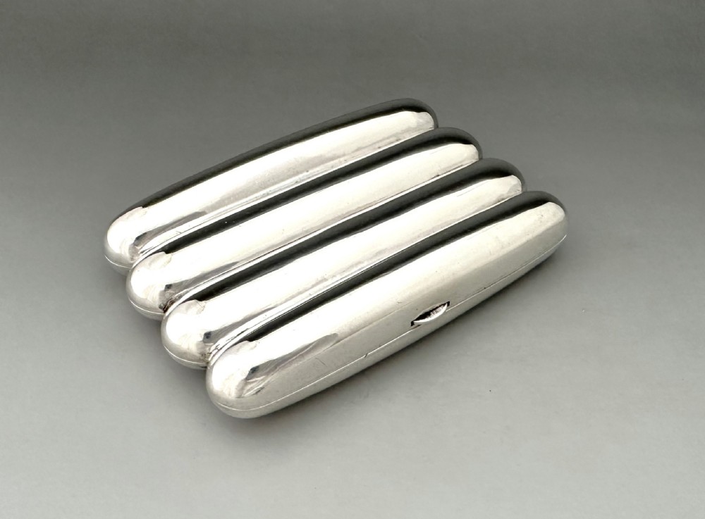 A handsome Victorian silver 4 finger cigar case