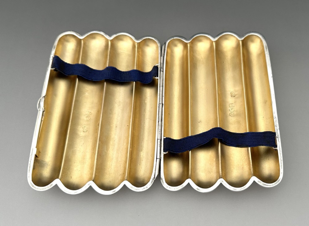 A handsome Victorian silver 4 finger cigar case View V