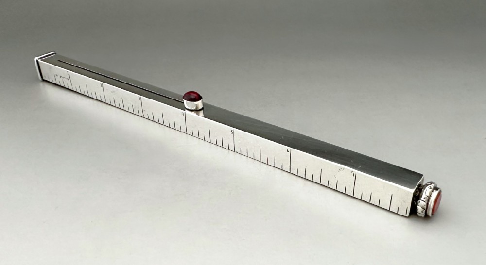 An extremely rare silver ruler with Wax seal & Pencil