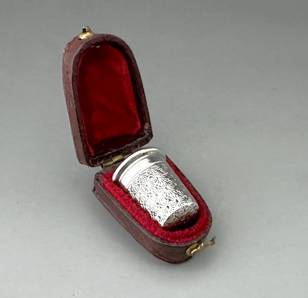 A collectable cased silver thimble by Charles Horner