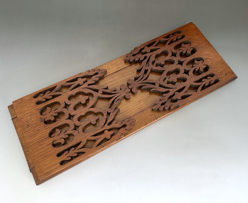 A Victorian maple wood extending book slide featuring pierced Gothic Revival tracery on hinged folding ends. View III