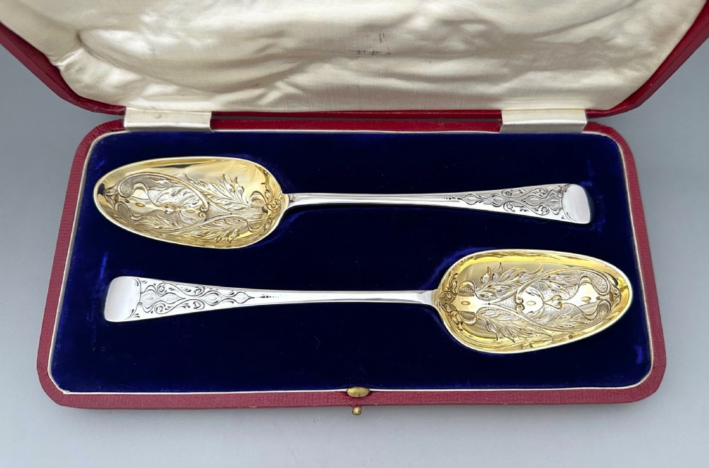 A superb pair of Art Nouveau boxed silver serving spoons