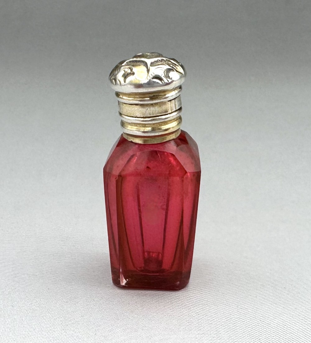 A gorgeous French silver gilt miniature scent bottle