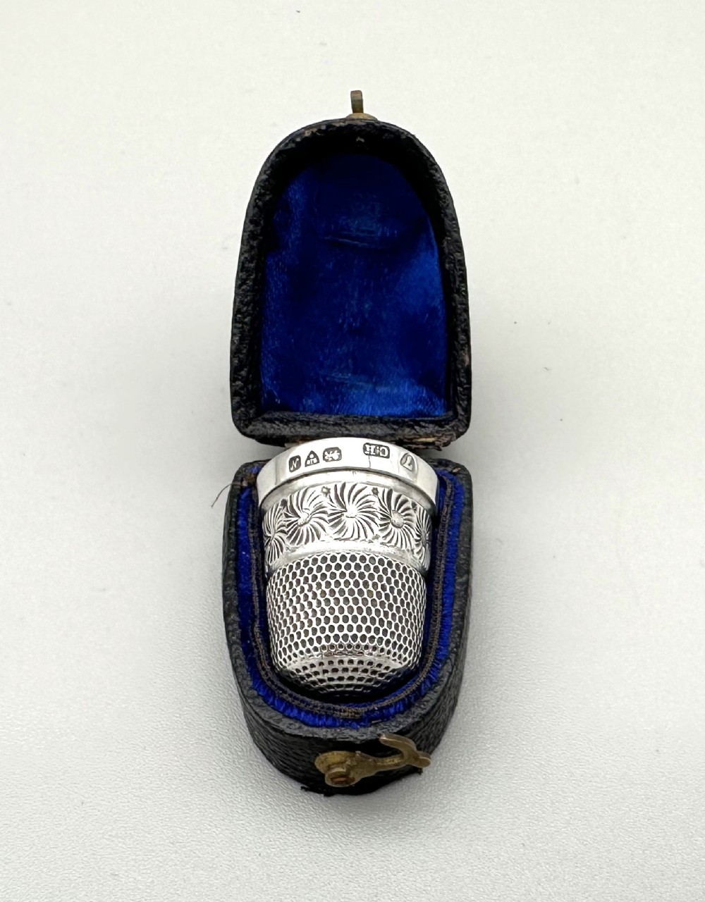 A collectable cased silver thimble by Charles Horner