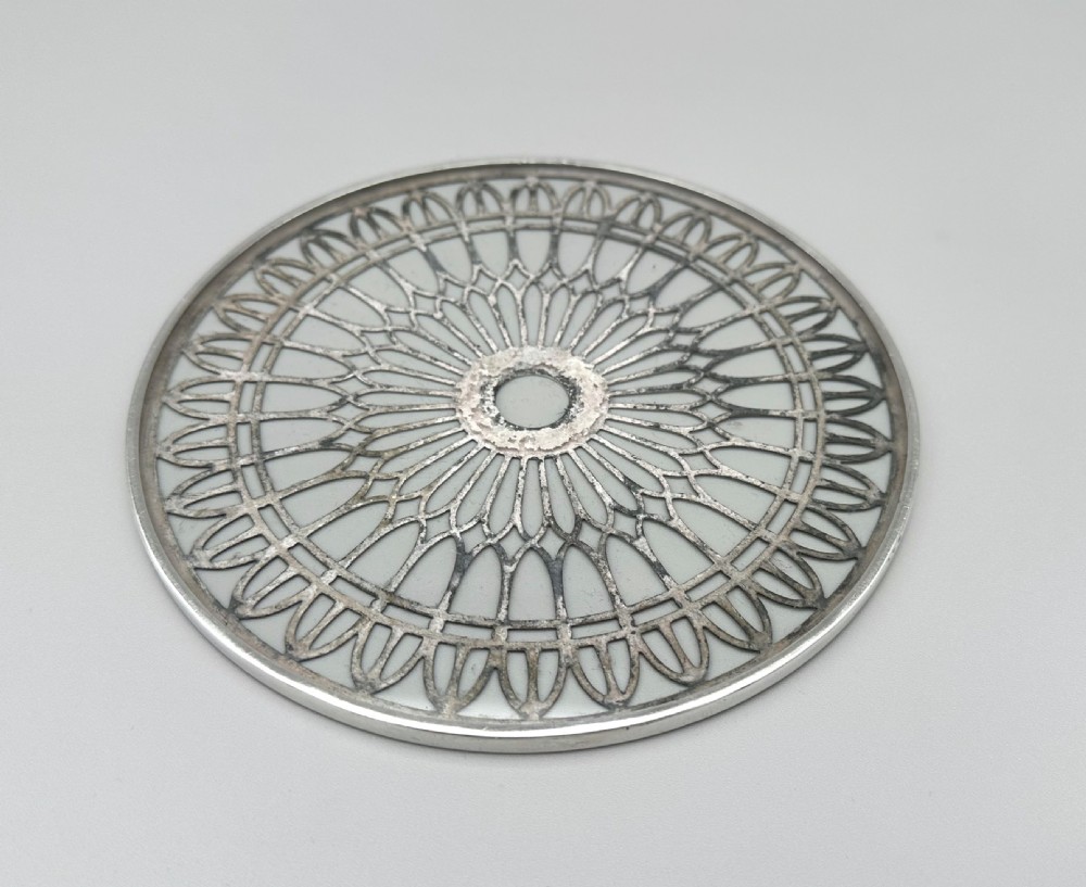 A stylish silver mounted large teapot stand/coaster View IV