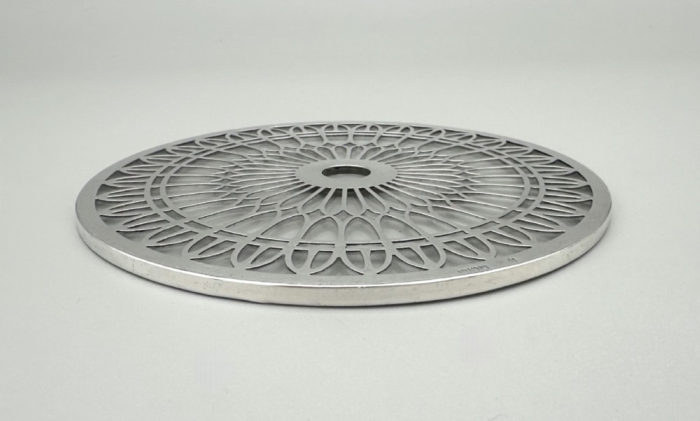 A stylish silver mounted large teapot stand/coaster View V