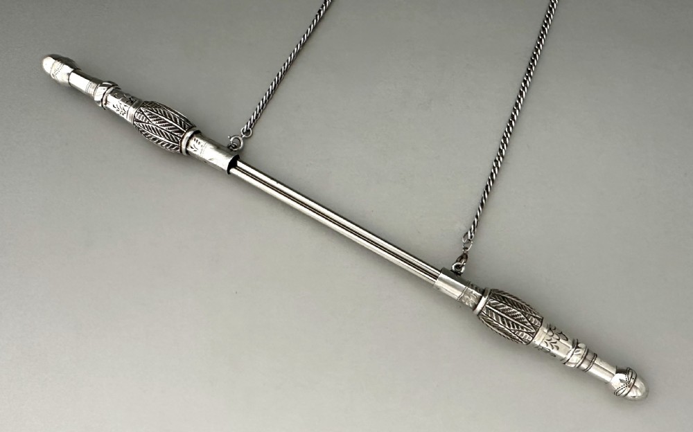 A rare pair of Dutch silver knitting needle guards View II