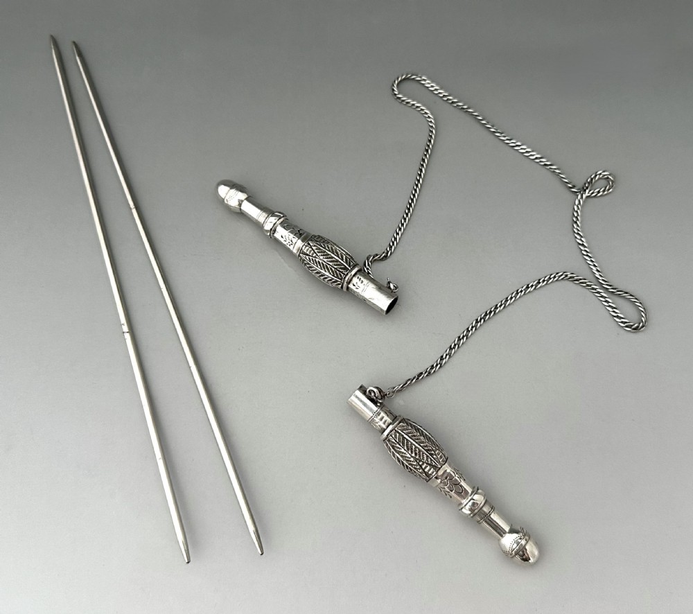 A rare pair of Dutch silver knitting needle guards