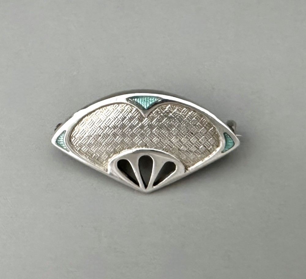 An attractive silver & enamel Charles Horner brooch