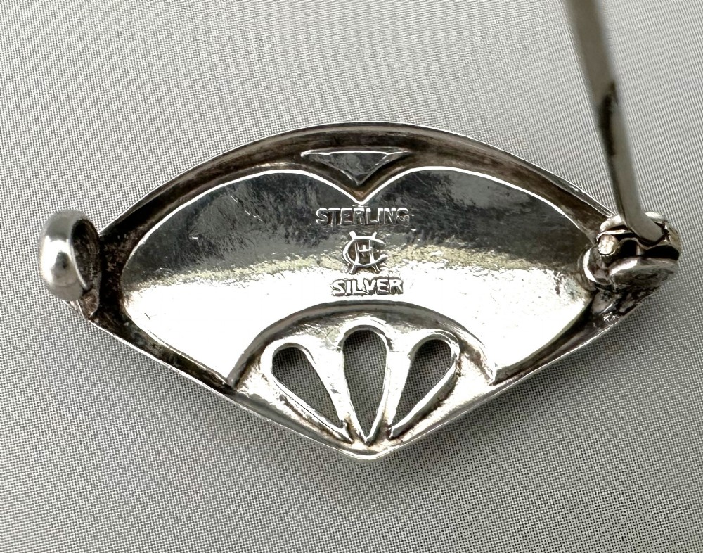An attractive silver & enamel Charles Horner brooch View V