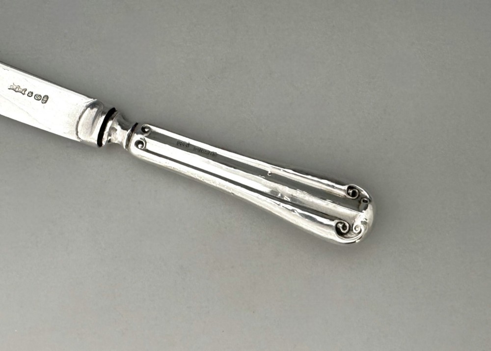A useful set of 6 boxed silver handled butter knives View IV