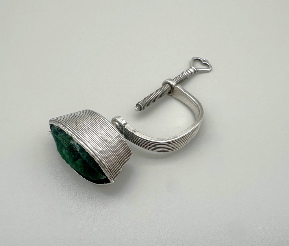 A rare 19th Century Dutch silver sewing clamp with pin cushion