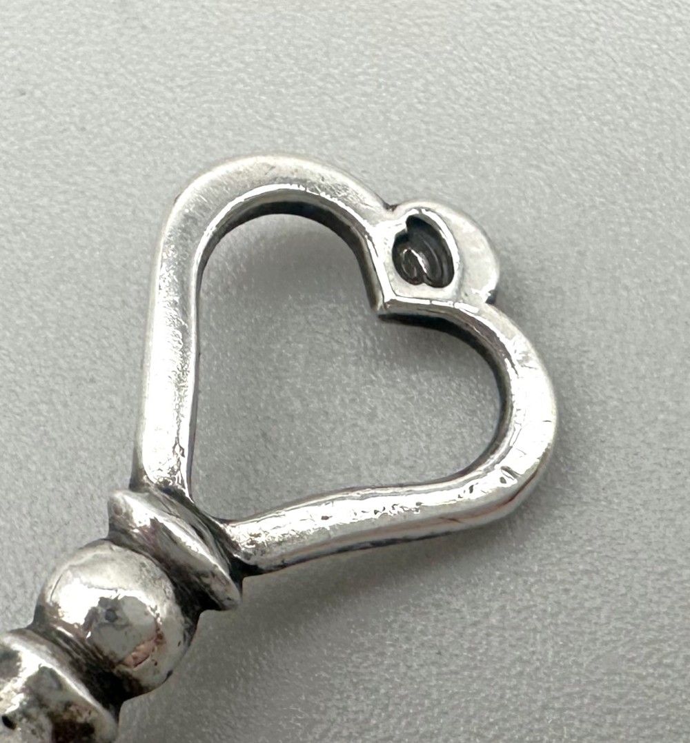 A rare 19th Century Dutch silver sewing clamp with pin cushion View X