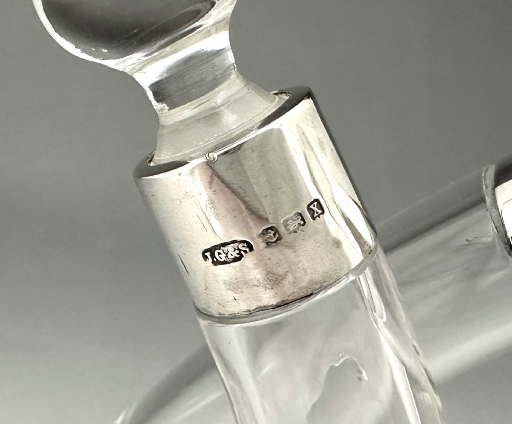 A George V silver mounted oil & vinegar duo View VII
