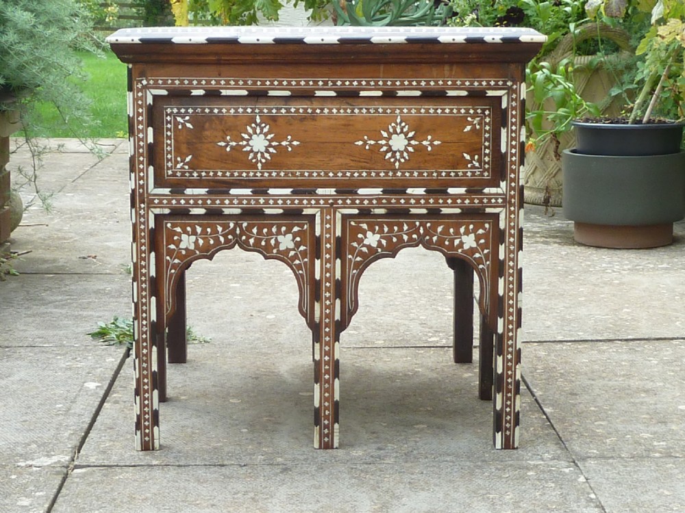 A square Anglo-Indian wooden side table with intricate bone inlay floral patterns and arched aprons. View II