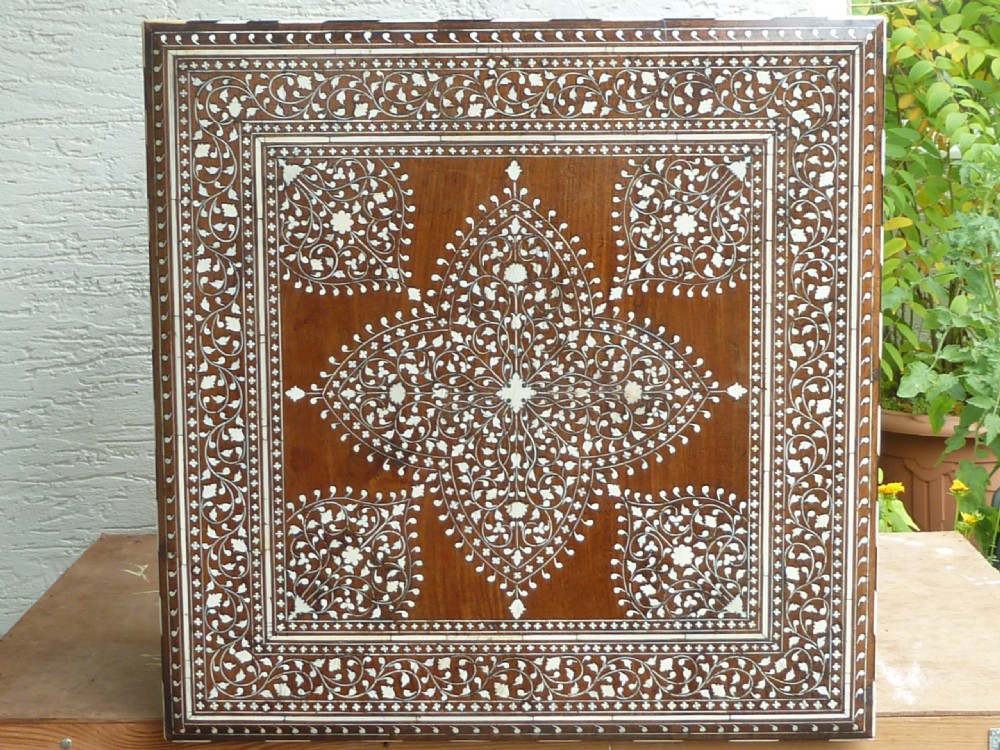 A square Anglo-Indian wooden side table with intricate bone inlay floral patterns and arched aprons. View V