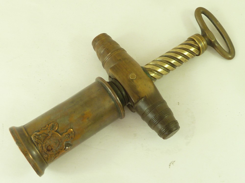 A Georgian patinated bronze Thomason patent mechanical corkscrew featuring a Royal Coat of Arms crest badge and steel helix. View IV