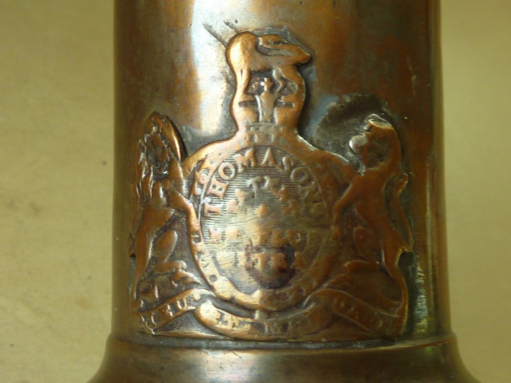 A Georgian patinated bronze Thomason patent mechanical corkscrew featuring a Royal Coat of Arms crest badge and steel helix. View VI