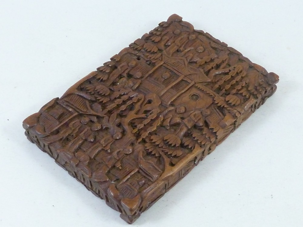 A rectangular nineteenth-century Chinese sandalwood visiting card case featuring high-relief relief carvings of figures, pavilions, and trees. View III