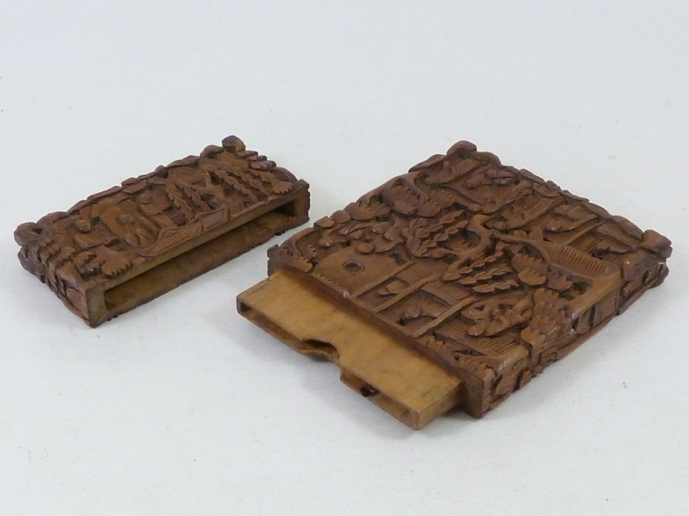 A rectangular nineteenth-century Chinese sandalwood visiting card case featuring high-relief relief carvings of figures, pavilions, and trees. View VI