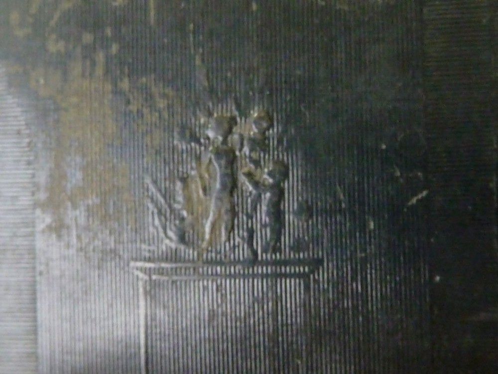 A rectangular dark pressed horn snuff box featuring a relief moulding of Napoleons funeral procession on the lid. View VIII