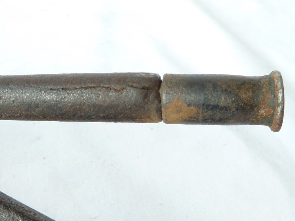 A pair of hand-forged Georgian dark steel ember tongs with elongated jaws and a spring handle mechanism. View VI