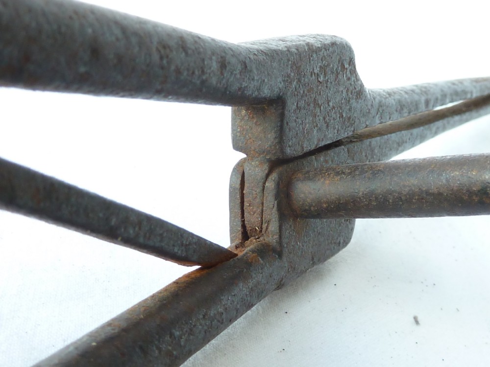 A pair of hand-forged Georgian dark steel ember tongs with elongated jaws and a spring handle mechanism. View VIII