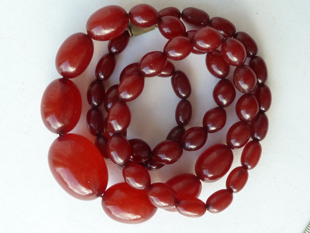 Bakelite Faux Cherry Red Amber Cloudy Bead Necklace 57 Grams  View X