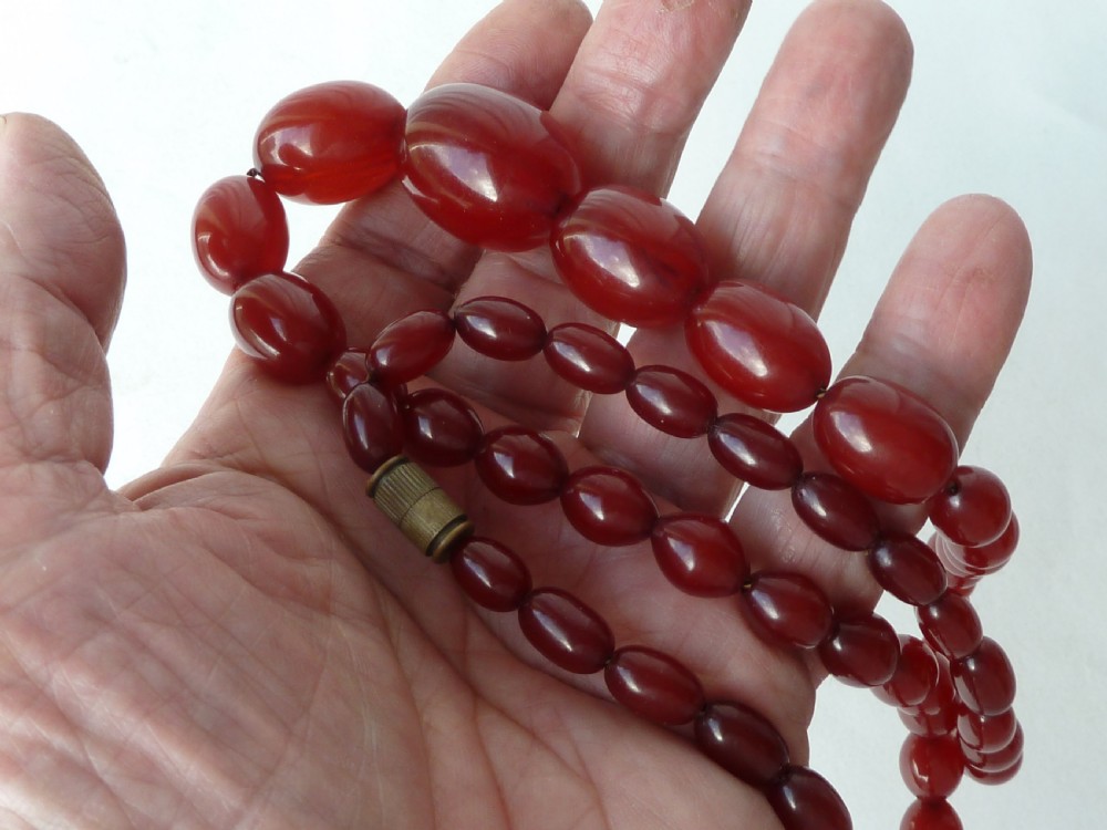Bakelite Faux Cherry Red Amber Cloudy Bead Necklace 57 Grams  View XI