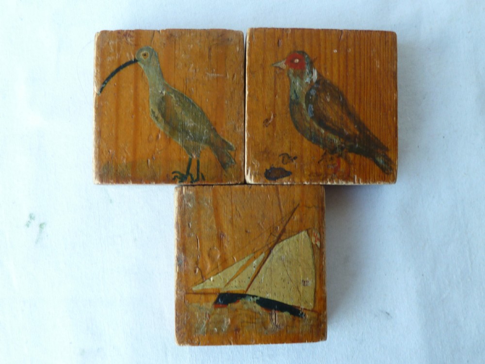 A rectangular wooden sliding-lid box featuring a hand-painted three-masted sailing ship on water against a natural pine background. View X