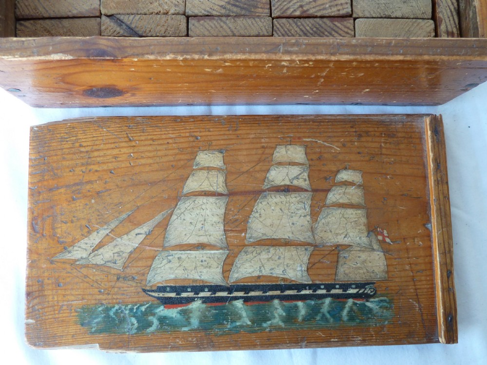 A rectangular wooden sliding-lid box featuring a hand-painted three-masted sailing ship on water against a natural pine background. View XI