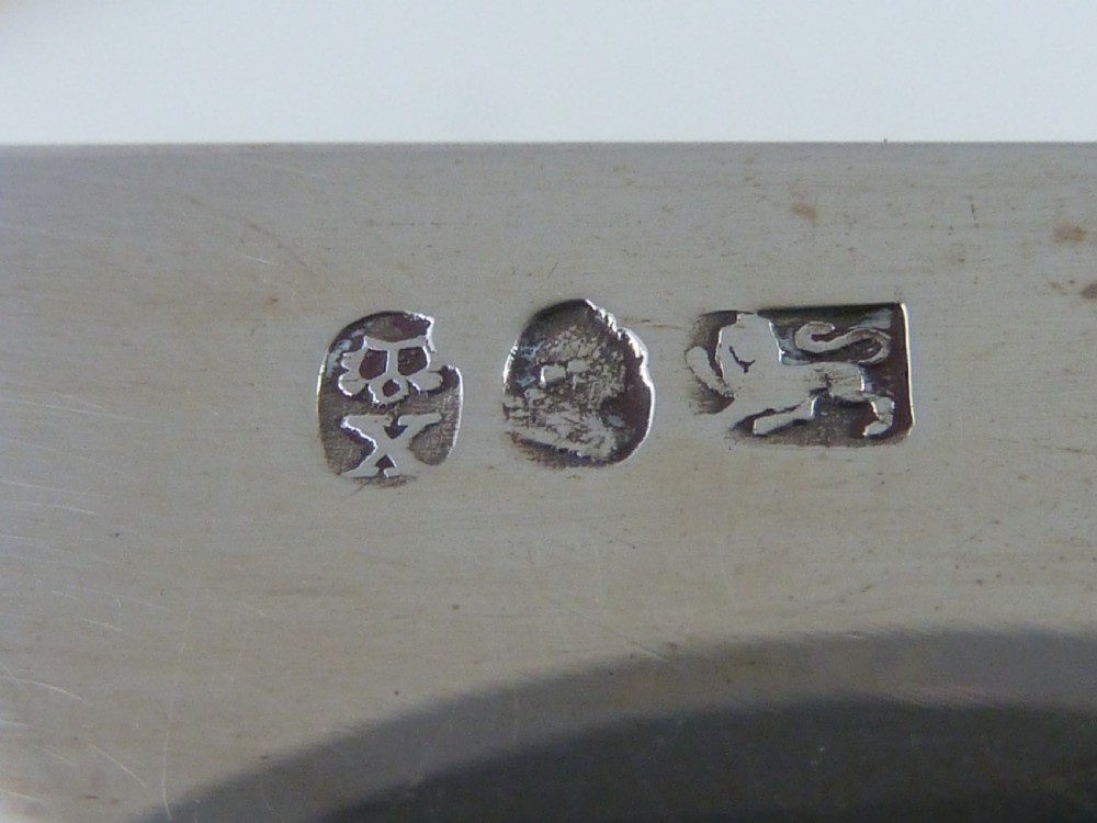 A boxed two-piece Georgian silver fruit knife and fork set with mother-of-pearl handles inside a blue velvet-lined case. View IV